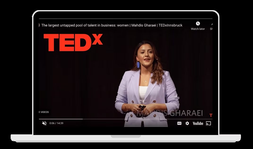 mahdis on stage during her tedx talk about women in business
